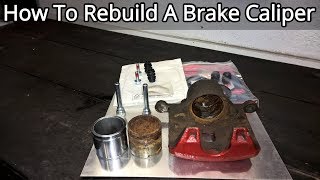 How To Rebuild A Front Brake Caliper  Complete Guide [upl. by Sontag]